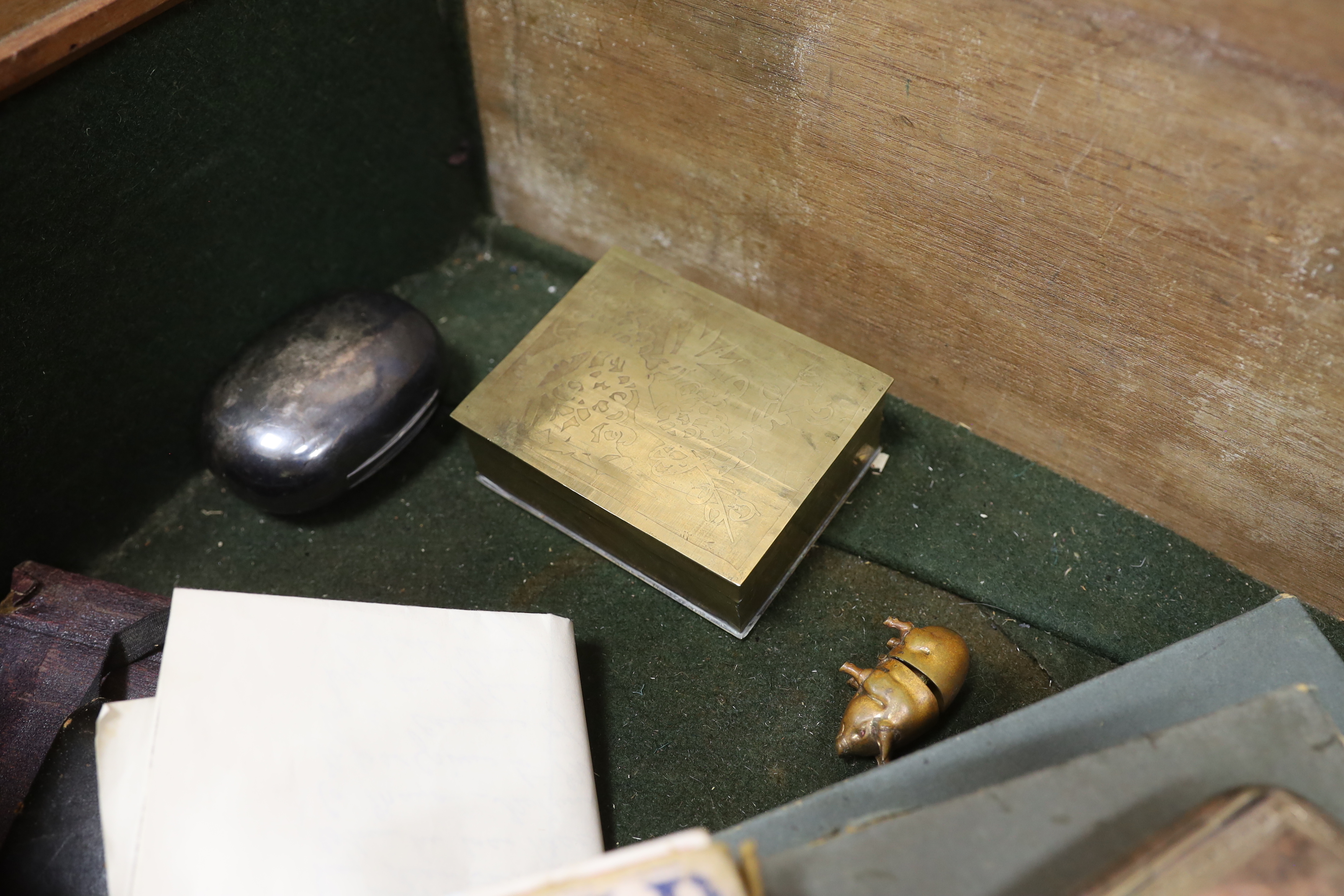 A mahogany strong box containing a small quantity of miscellaneous items, including snuff boxes